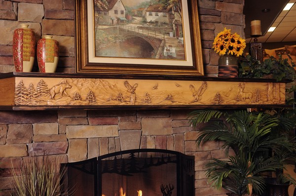 Combination of a variety of different décor pieces on fireplace mantel