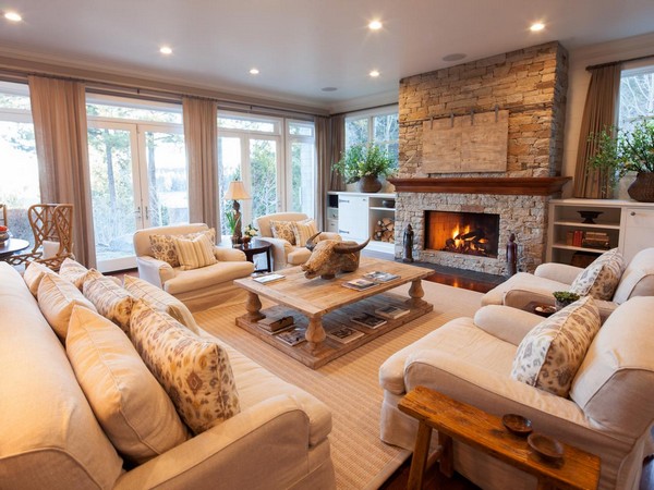 Spacious family room with stone fireplace that breathes warmth and comfort into the room