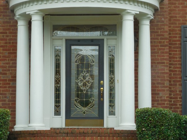 Frosted glass door with inscribed art